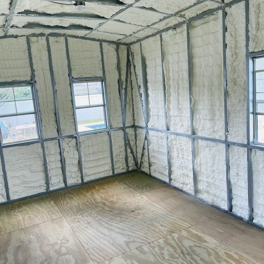 Closed-cell spray foam insulation applied to wall cavities in a residential project in West Caln